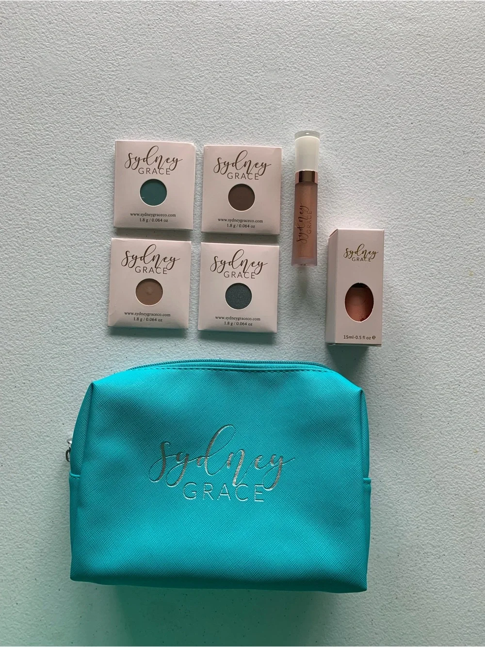 New 7 Piece Sydney Grace Cosmetics Lot Eyeshadows Lipgloss Nailpolish Bag